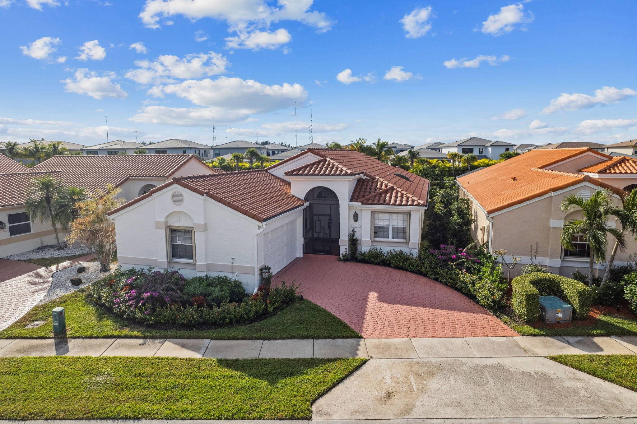 Nestled at the private end of a gated community, this inviting 3bed 2bath home blends Mediterranean style with serene living.