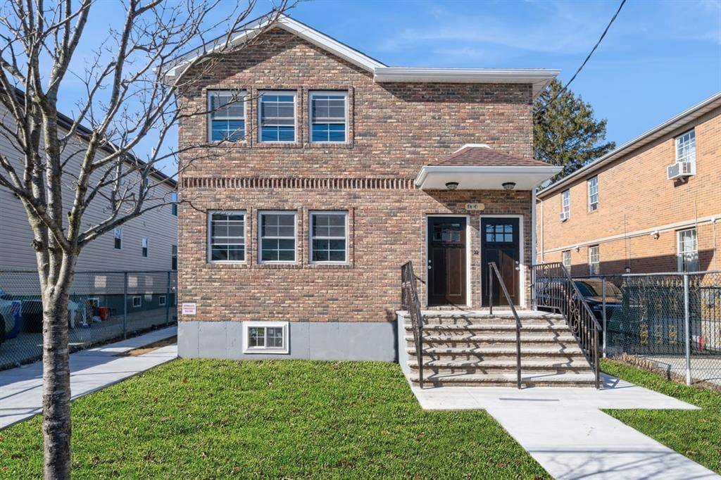 NEW CONSTRUCTION 147 24 224th Street, a newly built two family home that combines modern style with great income potential.