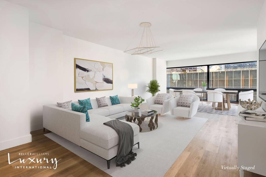 As you enter through the foyer of this sophisticated corner two bedroom, two and one half bathroom apartment, you step into a spacious sunlit corner living room large enough to ...