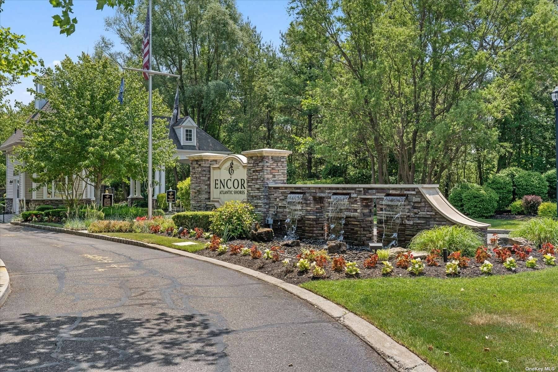 Welcome to a luxurious retreat nestled within a gated community that exudes the essence of country club living.