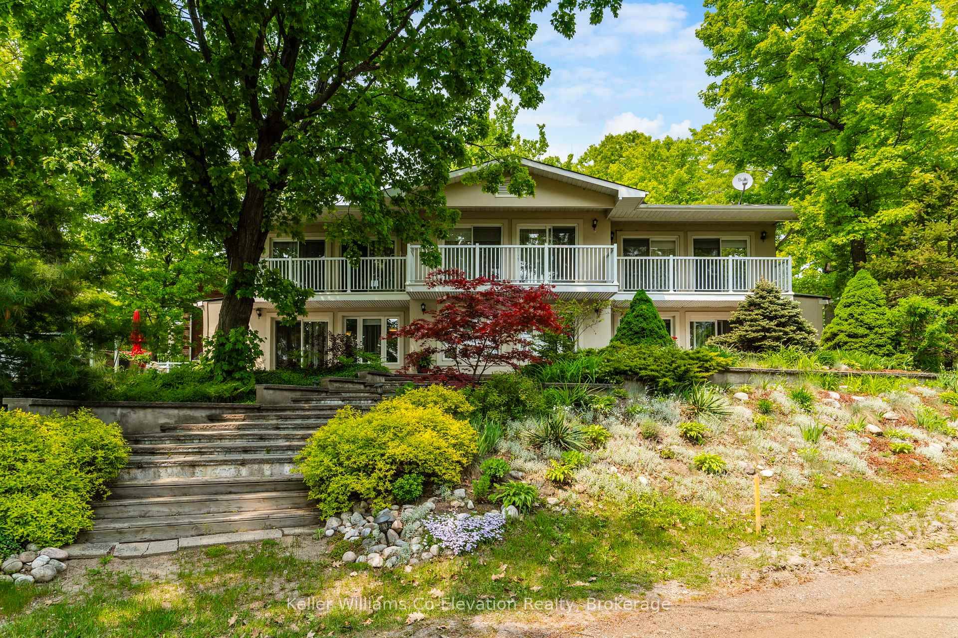 Welcome to 730 Concession 15 West, a rare and versatile triplex nestled in Tiny Township just steps from the beach, yet free from the costs and complications of waterfront ownership.