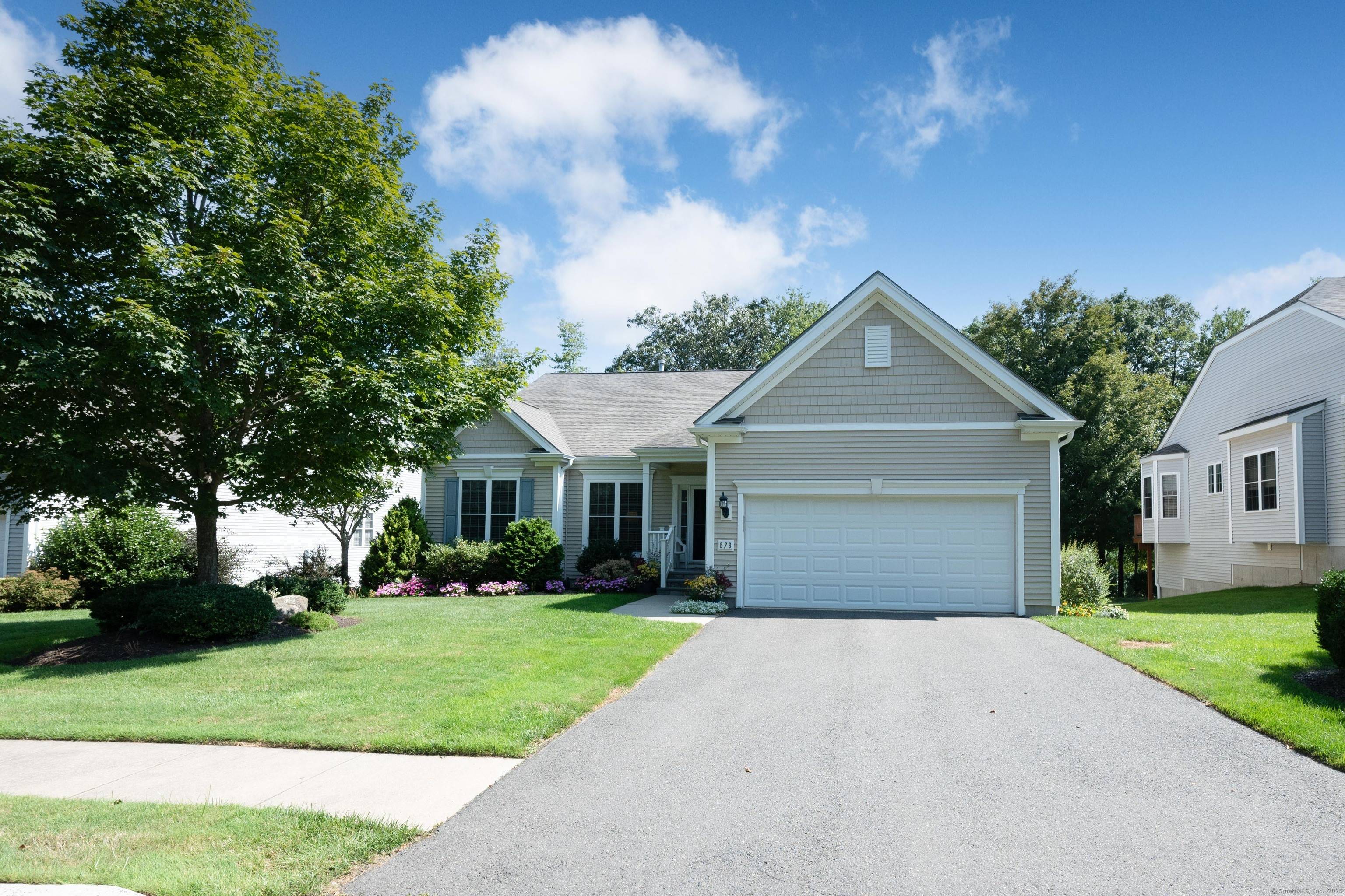 Great open floor plan Adler model on 4th fairway at Oxford Greens Golf Course.