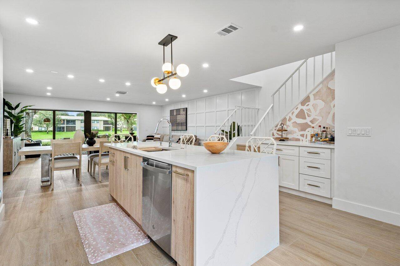 This contemporary townhouse, updated in 2022, effortlessly blends luxury with modern flair to captivate the most discerning buyers.