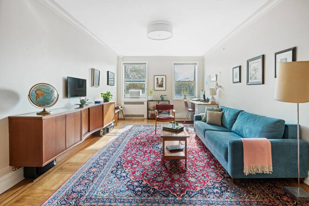 Sunlight, space, and pre war charm abound in this beautifully maintained top floor two bedroom, two bath home in beautiful Ditmas Park.