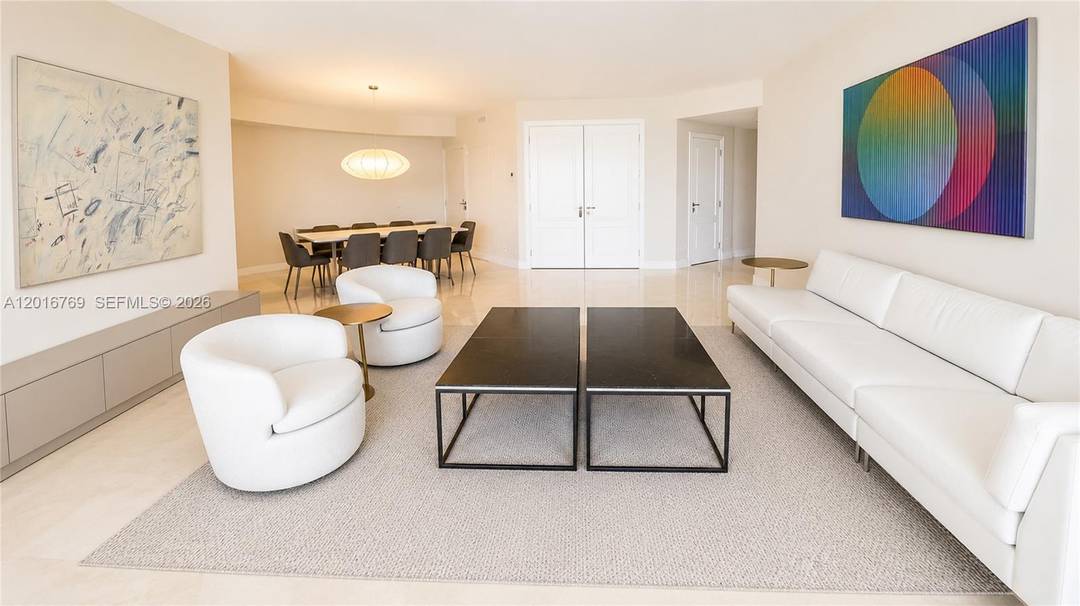 Just steps from the beach, enjoy luxury living in this stunning 3 Bedroom Lake Villa residence at The Ocean Club, Key Biscayne offering a perfect blend of elegance and comfort.