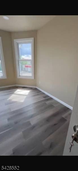 COMPLETLEY REHABED 3 FAMILY HOME.