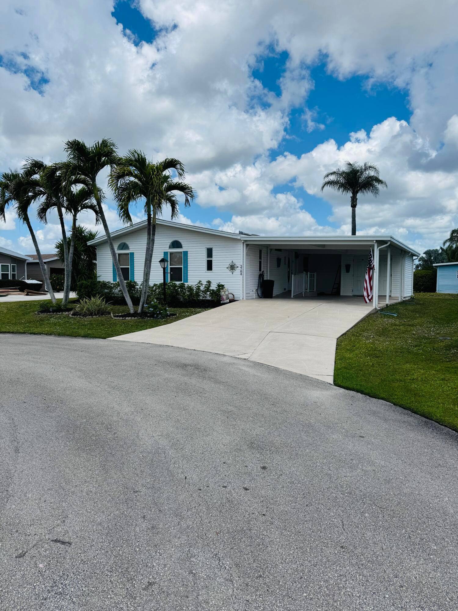 Land Owned ! This charming 2 bedroom, 2 bathroom mobile home is located in the desirable Savanna Club, a 55 community in Port St.