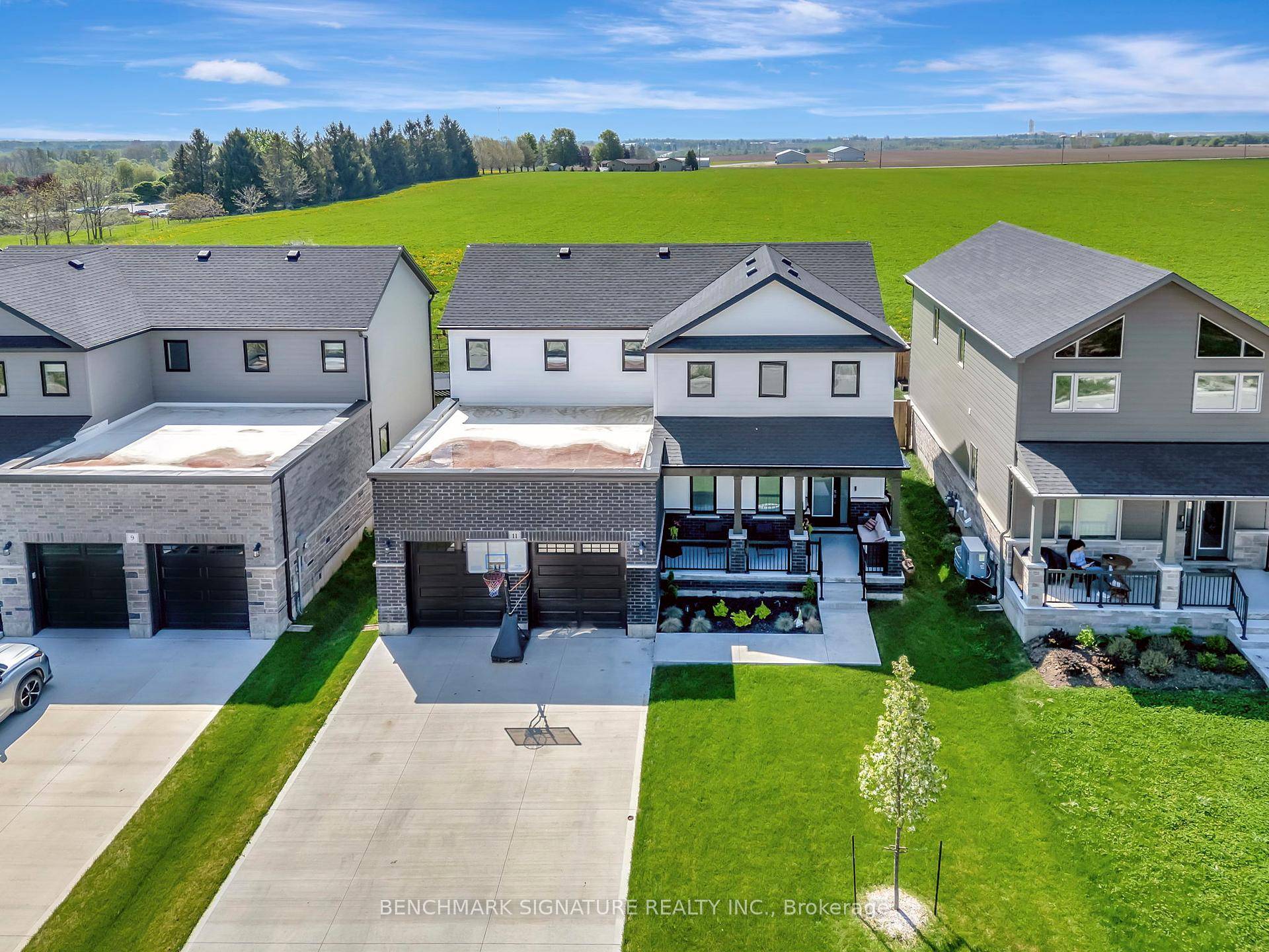 Welcome to 11 Totten Street in Embro, a beautifully appointed 4 bedroom, 2, 279 sqft Net Zero Ready home offering luxury, comfort, and panoramic views of open farmland.