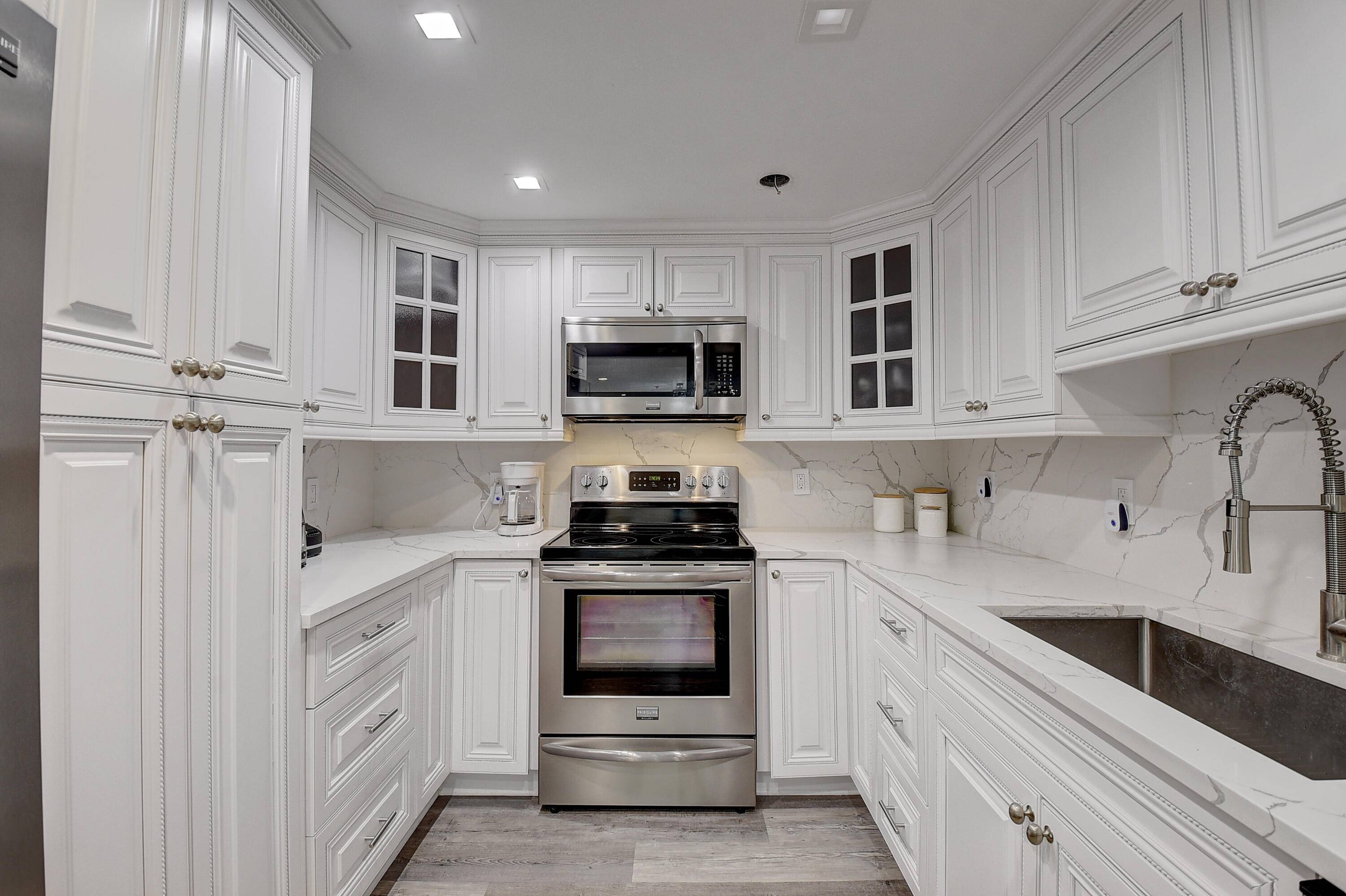 BEAUTIFULLY RENOVATED FULLY FURNISHED CONDO IN THE ''E'' BUILDING FACING THE MARINA 1, 305 SQ.