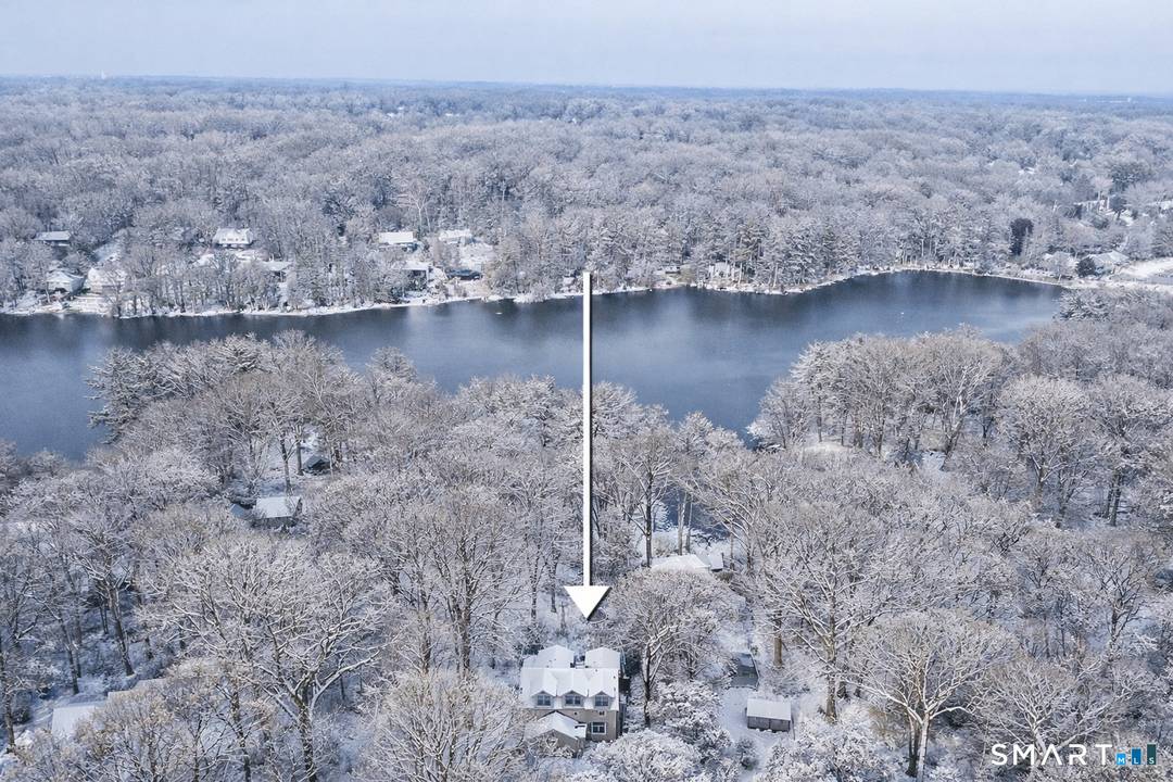 Welcome to a rare gem that seamlessly blends elegance, comfort, the coveted Pinewood Lake lifestyle.