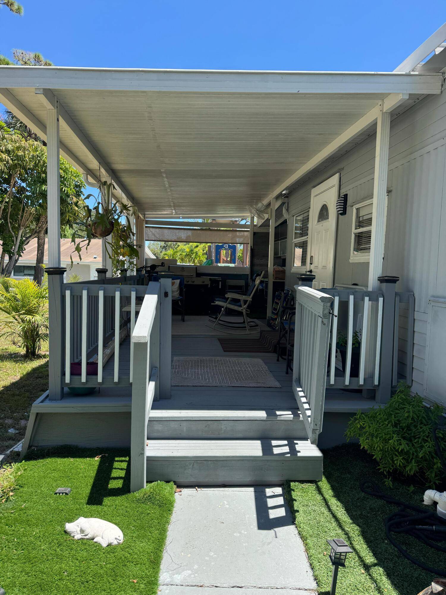 Charming mobile home featuring 3 bedrooms, 2 bathrooms, All age, a modern kitchen with brand new stainless steel appliances, laundry room, outdoor kitchen, and a spacious, breezy porch perfect for ...