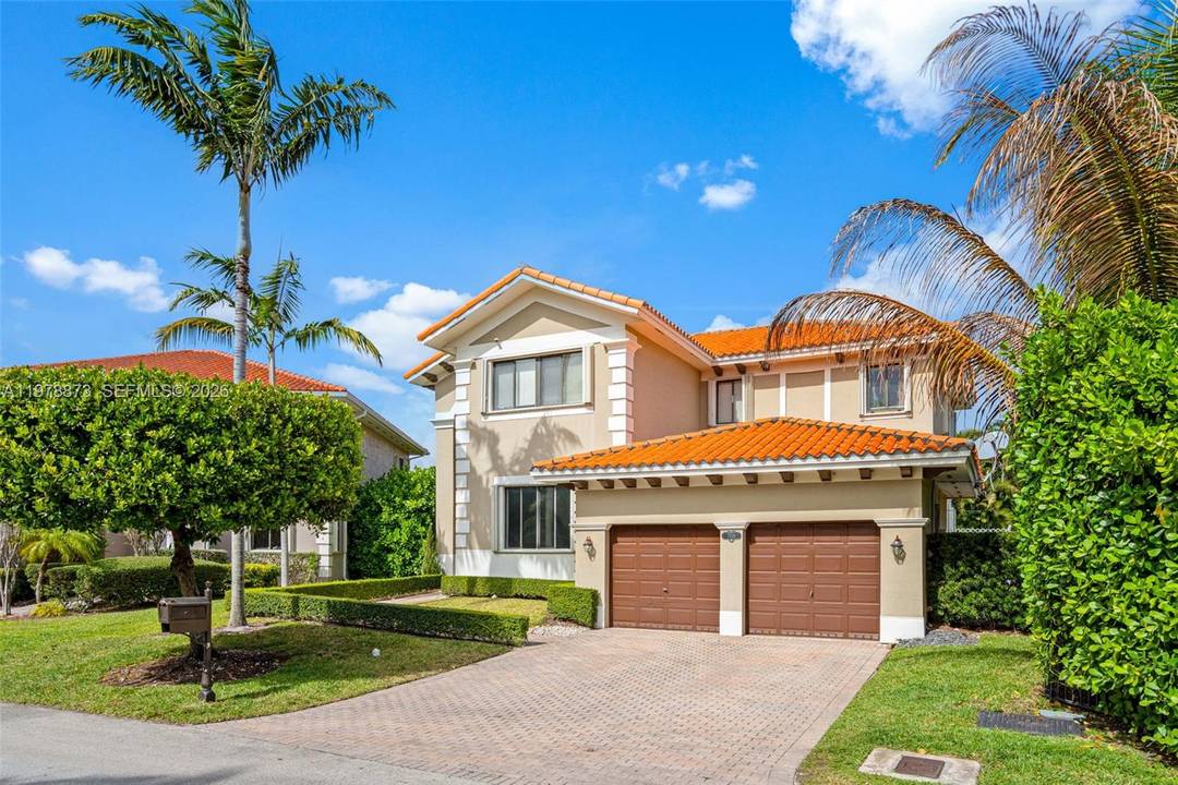Elegant home located in the prestigious Cutler Cay community.