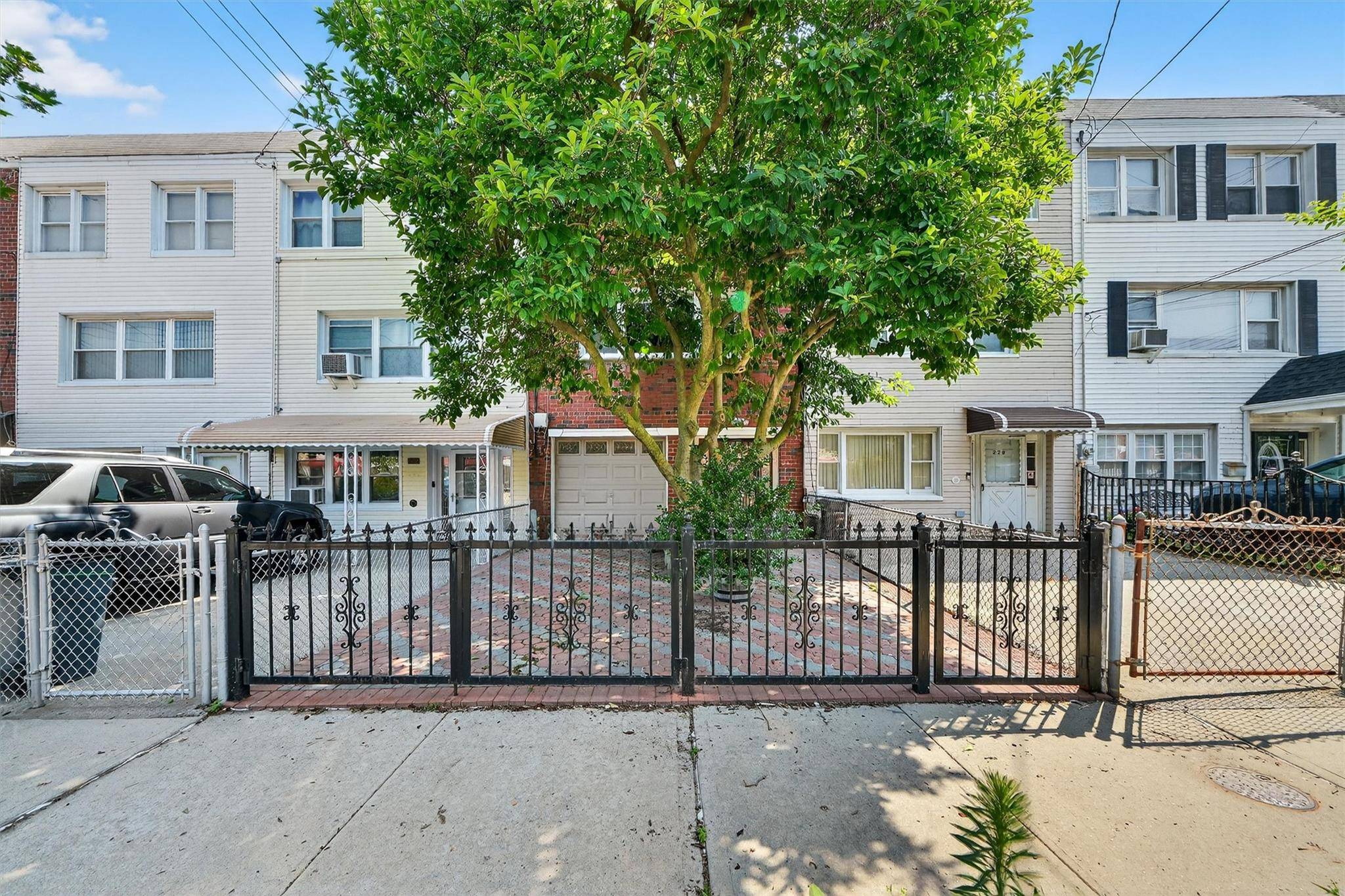 Large BRICK single family in Throggs Neck with finished basement.