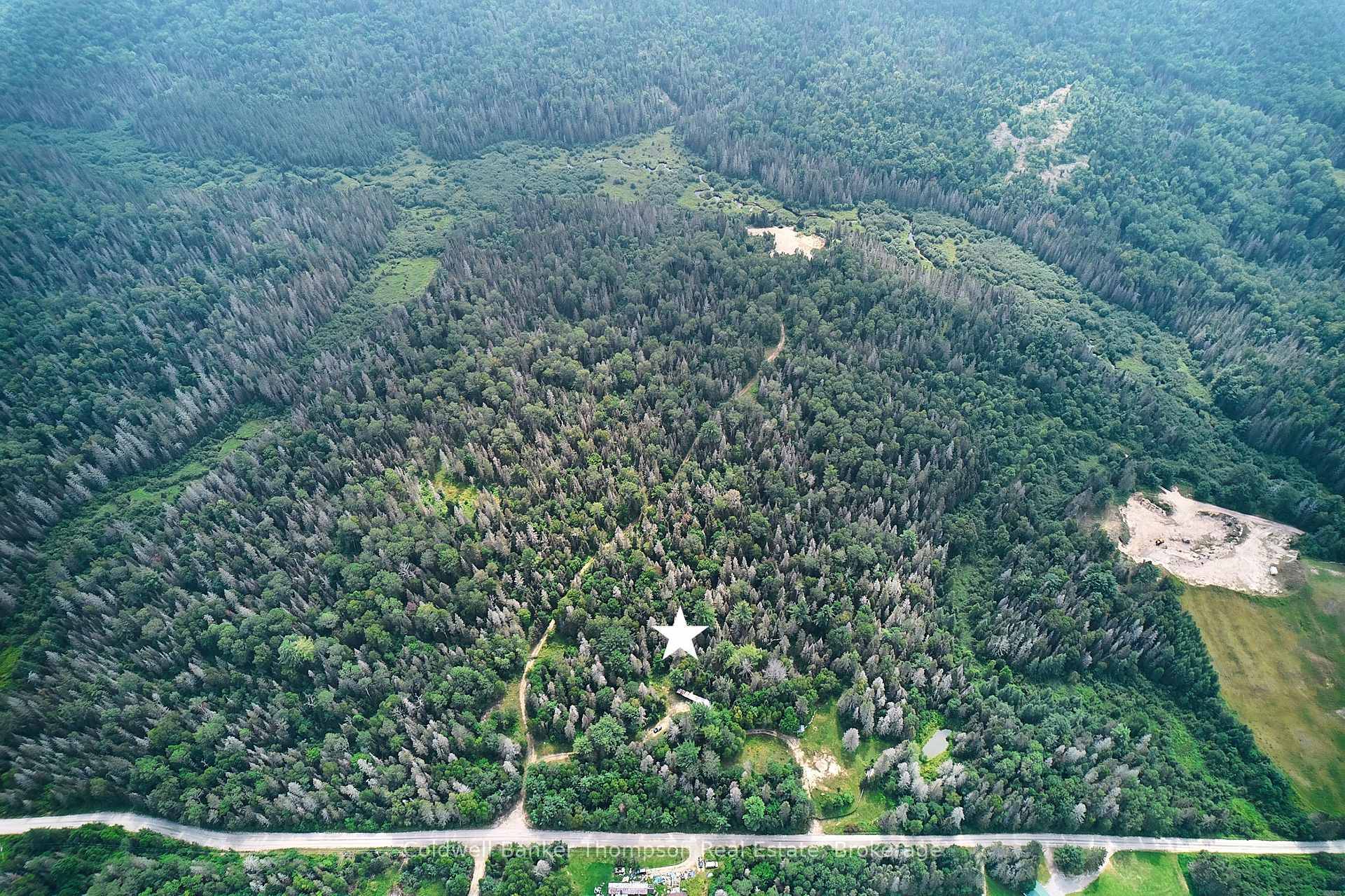 Introducing a remarkable 100 acre property that epitomizes the ideal blend of comfort and outdoor adventure.