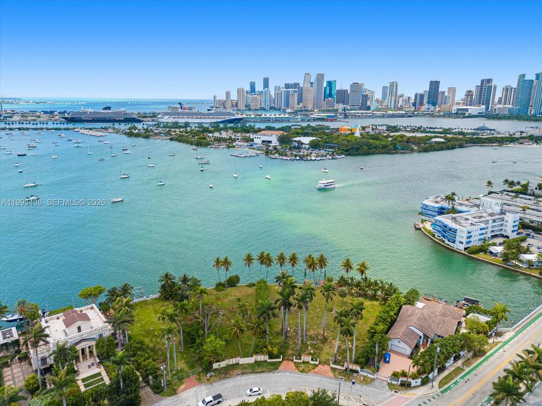 Rare waterfront property featuring over 103 feet of direct frontage on Biscayne Bay with direct downtown sunset views.