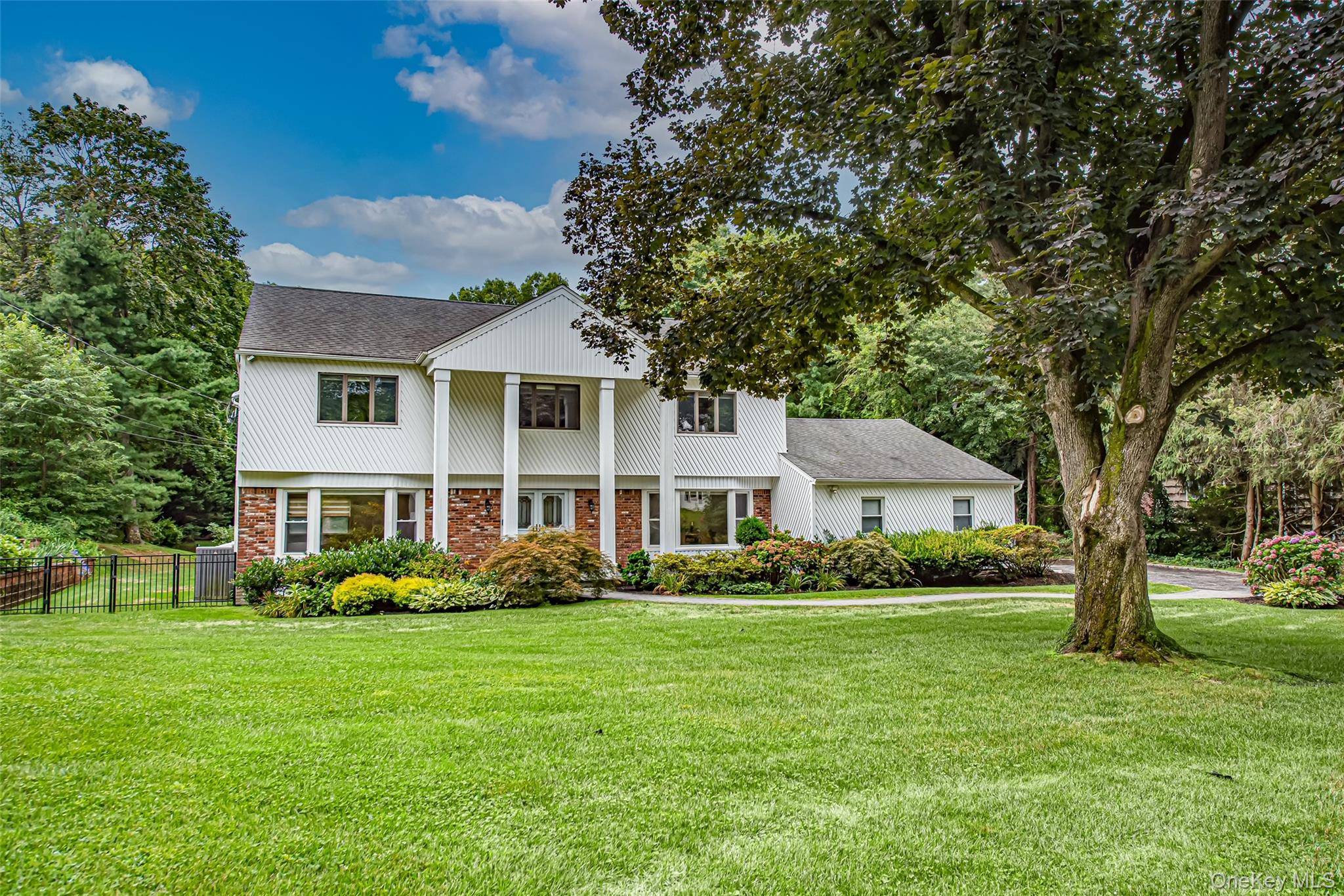 Welcome to this spacious and beautifully updated 5 bed 4 bath center hall Colonial on a flat and cleared 1 acre in Dix Hills Half Hollow Hills School District.