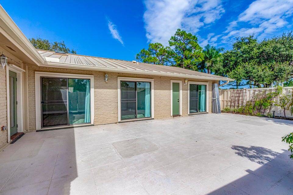 Immaculate 2 bedroom, 2 bath townhouse featuring a large private courtyard perfect for outdoor living and entertaining.