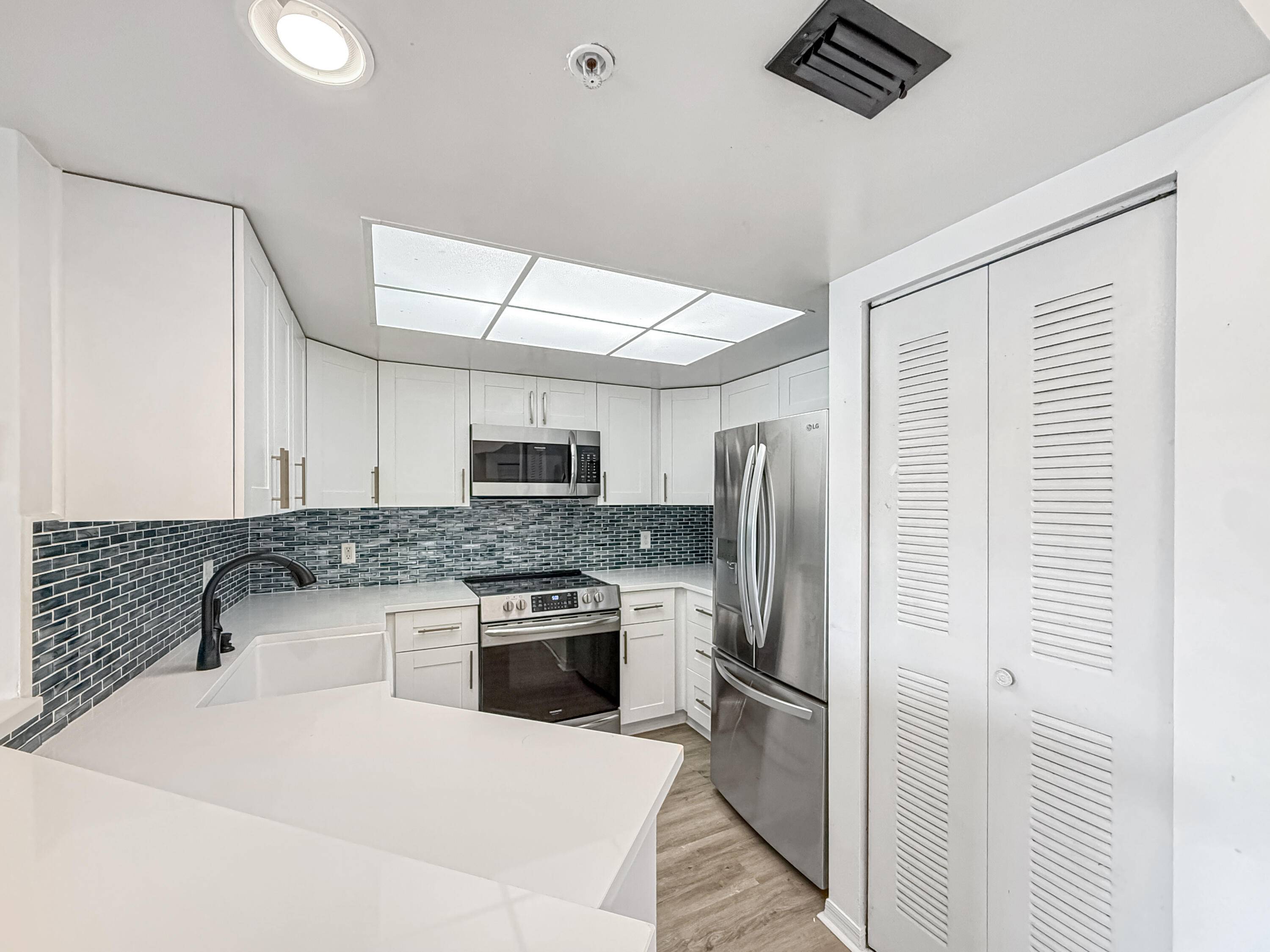 Welcome home to your updated, light bright 2 bed 2 bath, 3rd floor condo with covered balcony overlooking amazing lake garden.