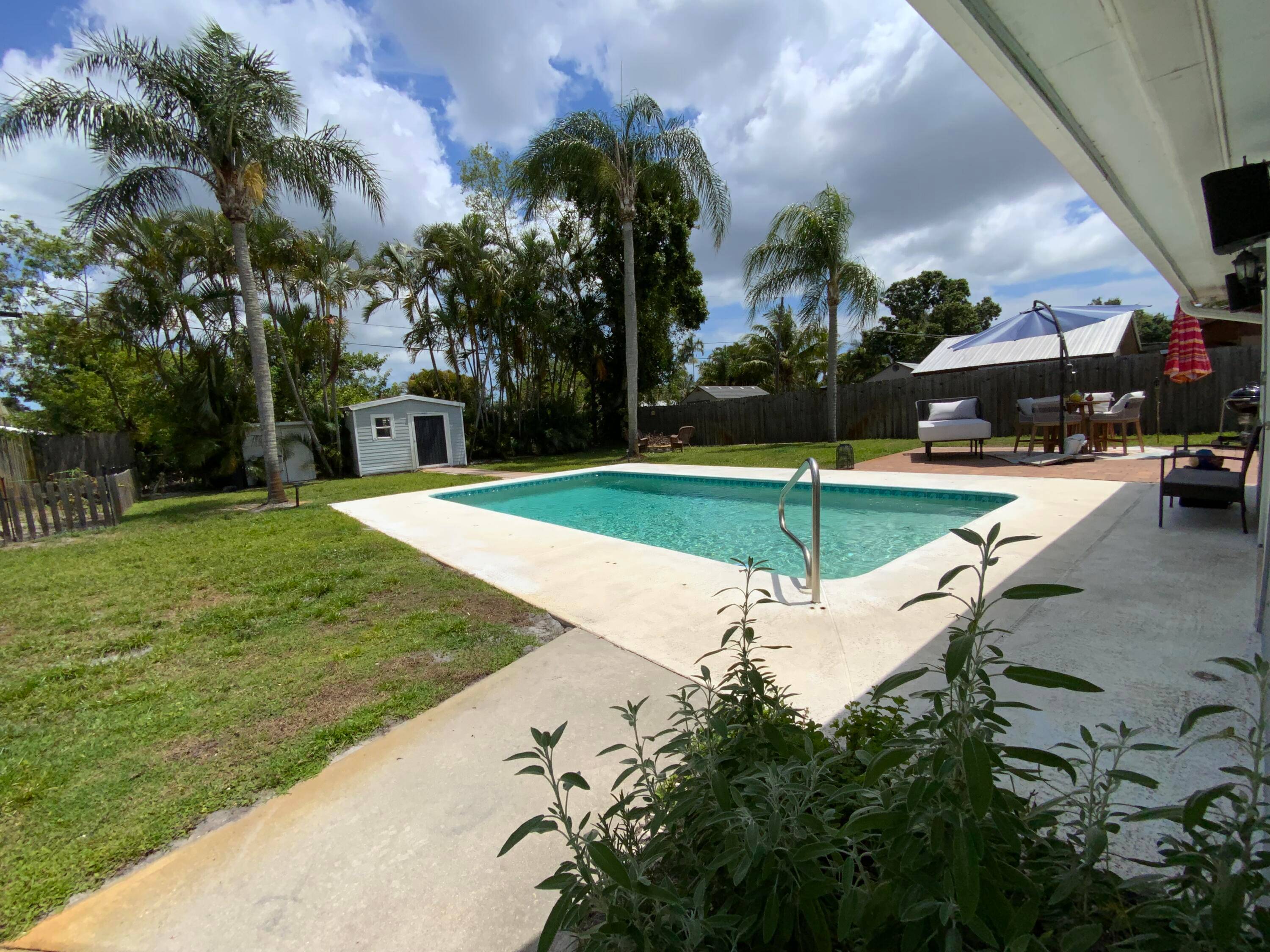 This Charming Palm City Pool Home No HOA !