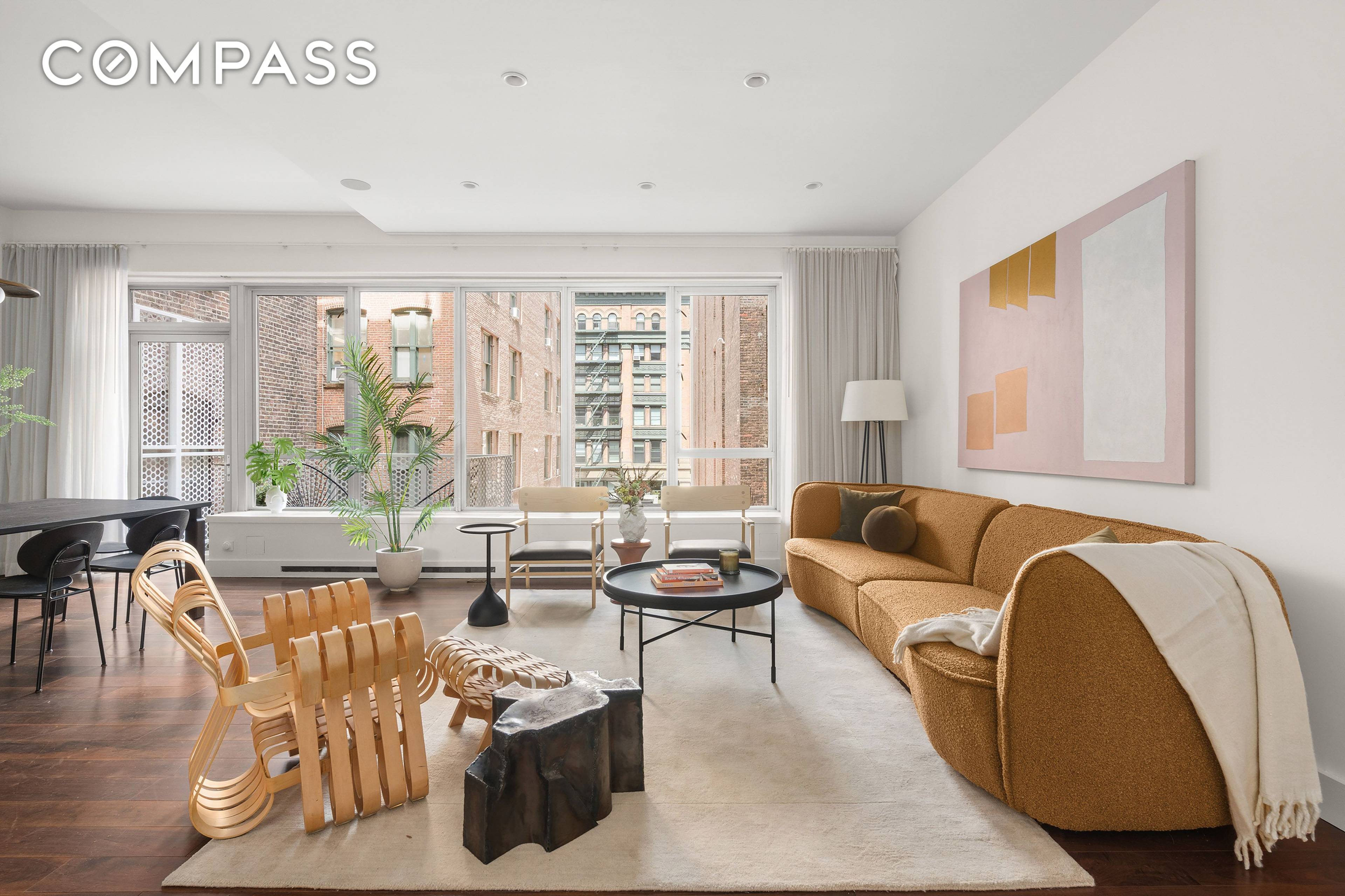 An expansive two bedroom, two bathroom residence with a terrace offering refined living in a boutique, amenity rich condominium on the city's most coveted cobblestone block Bond Street.