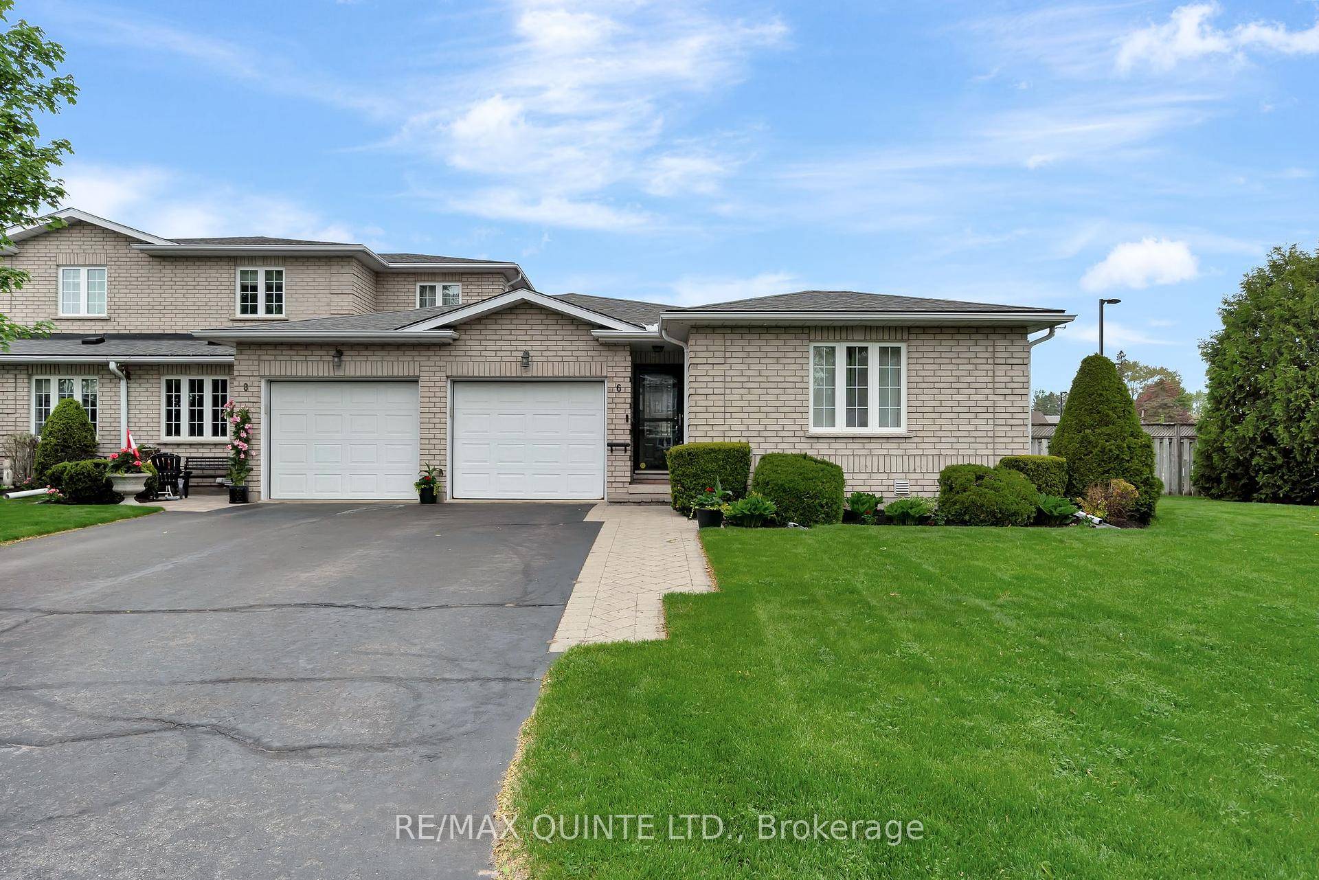 Nestled in a serene neighbourhood, this delightful end unit townhome bungalow at 6 Pinegrove Court combines modern comfort with traditional charm.