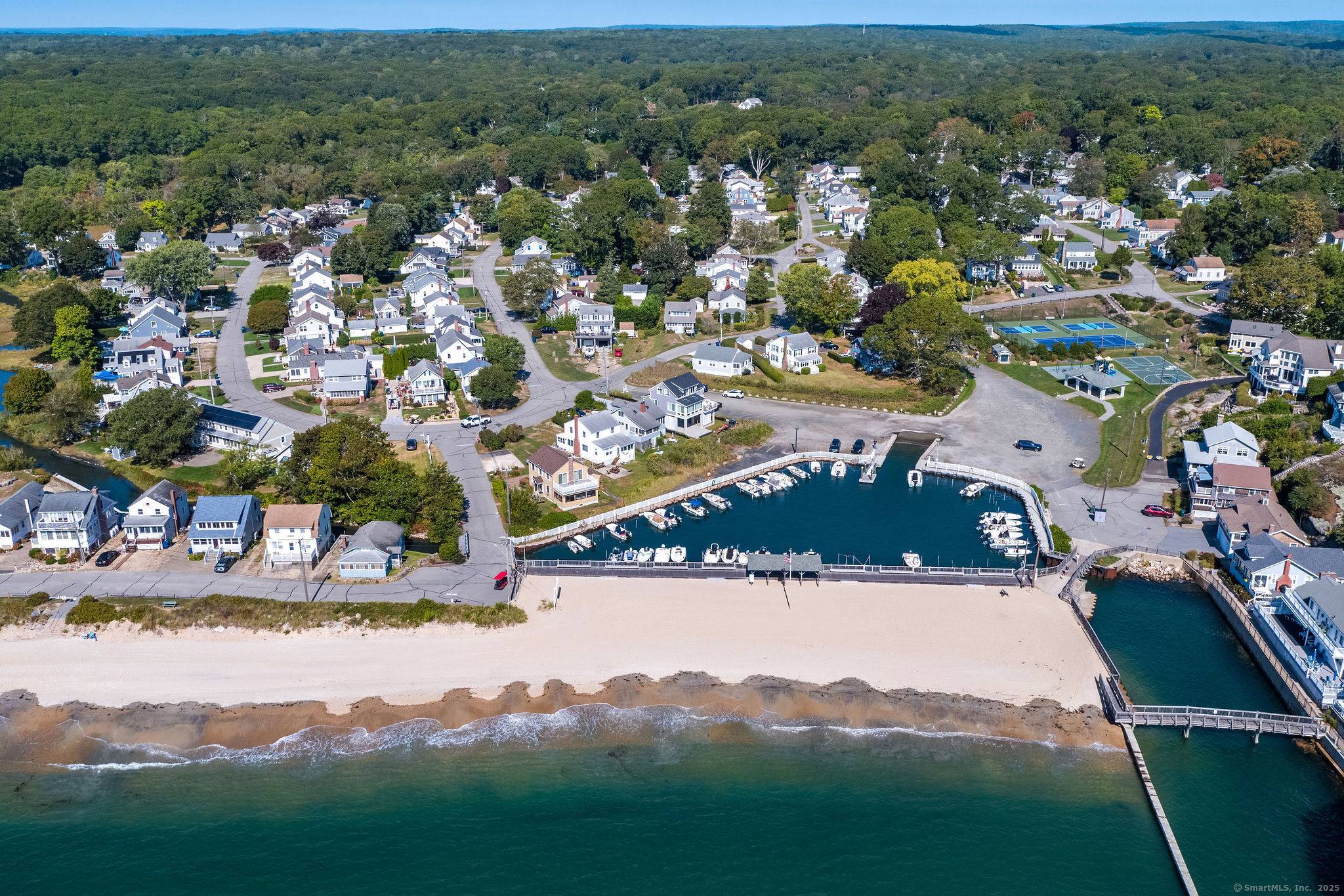 If you're drawn to the timeless charm of the classic beach lifestyle, this Point O' Woods property embodies it completely.