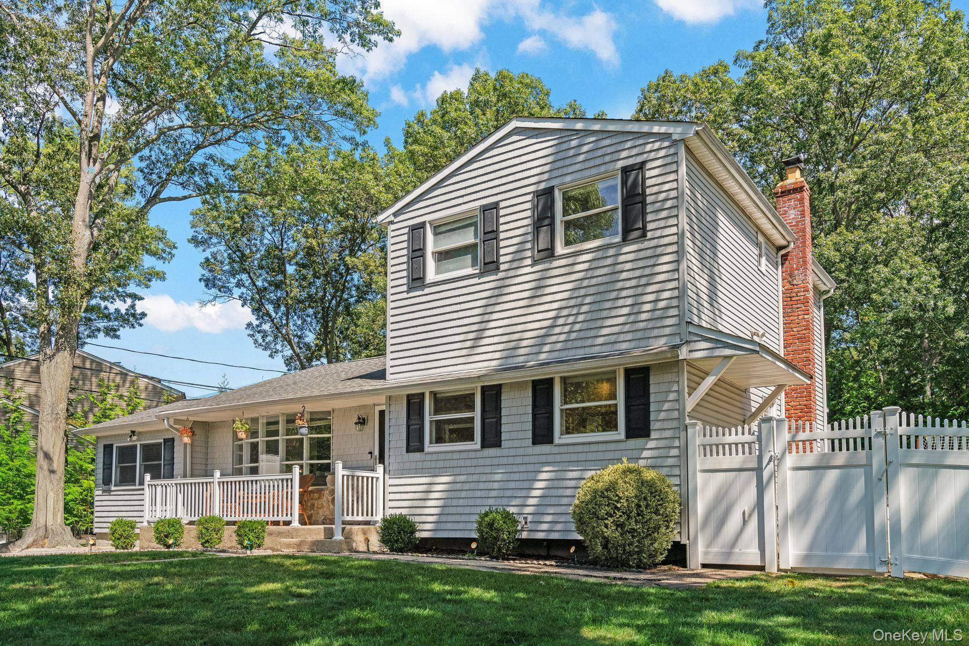 This is a must see ! Set on a quiet mid block location, in a fantastic neighborhood, this expanded ranch offers a layout designed for both everyday living and entertaining.
