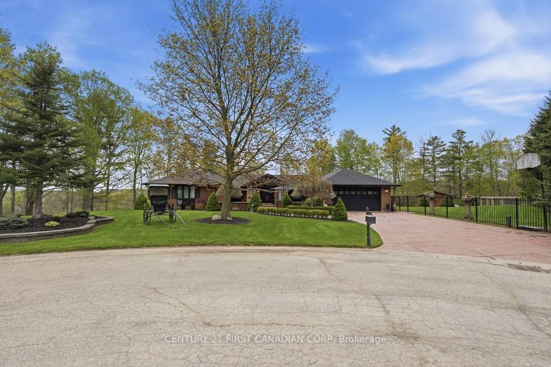 Tucked away on an exclusive cul de sac of just five distinguished custom residences in prestigious West London, this extraordinary executive ranch offers a rare blend of luxury, privacy, and ...