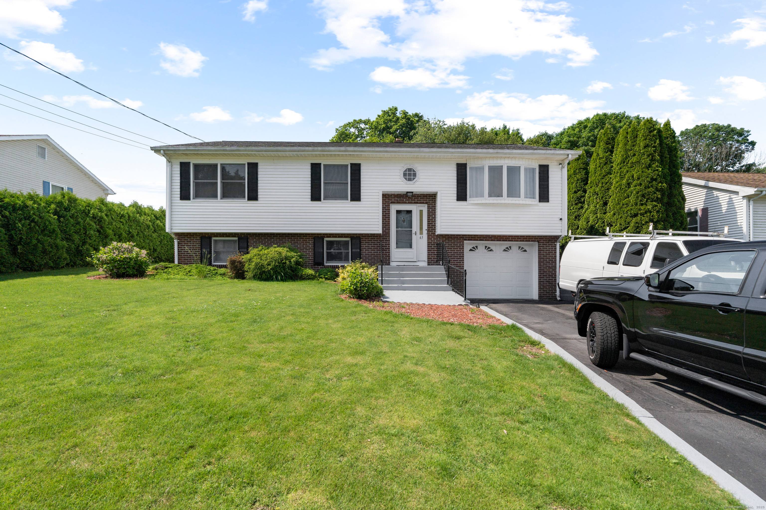 This spacious four bedroom, three bathroom home sits on approximately 0.