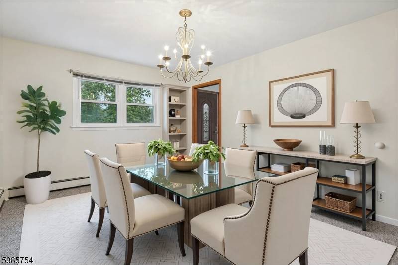 This charming Cape Cod offers storybook curb appeal with picturesque landscaping, a level lot, and valuable updates including roof, siding, and front walkway steps.