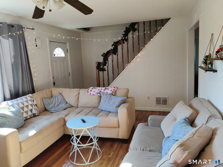 Beautifully updated 5 bedroom, 2 bath Cape located on a quiet street in Bridgeport's desirable North End.