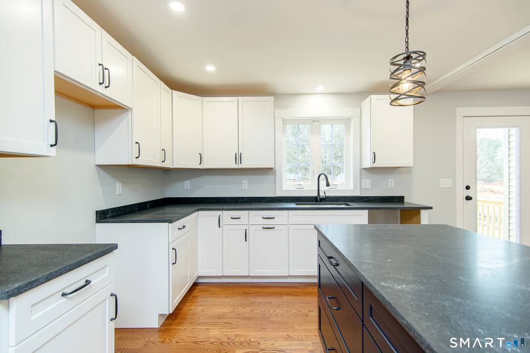 SIMILAR TO BE BUILT 173 RT 205 Brooklyn CT will get you close to subdivision.