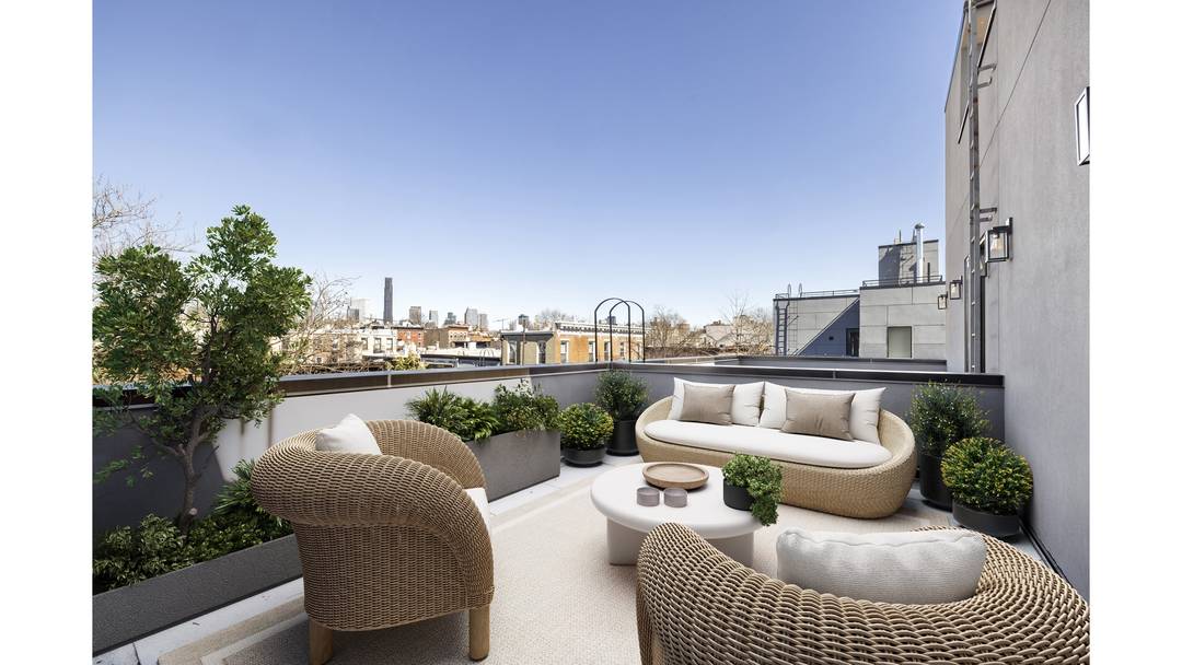 Introducing 112 Luquer Street, nestled in the vibrant heart of Carroll Gardens !