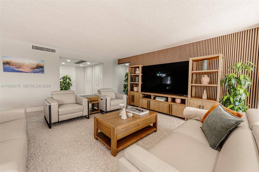 Welcome to this updated and tastefully furnished residence in the gated waterfront of Cricket Club Condo.