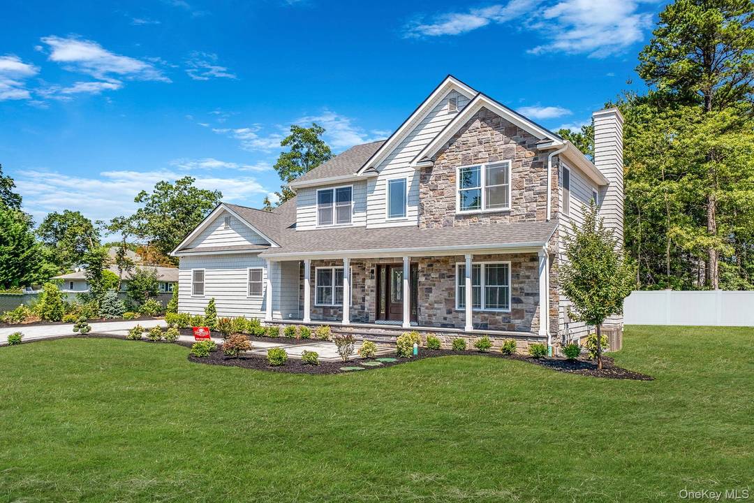 Premier new construction opportunity in Port Jefferson Station featuring the Birmingham model by Terra Construction Group.