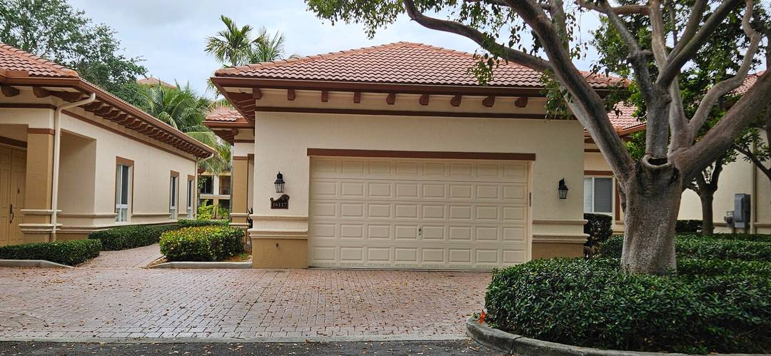 Come explore the private single story home in the gated Palms of Weston community.