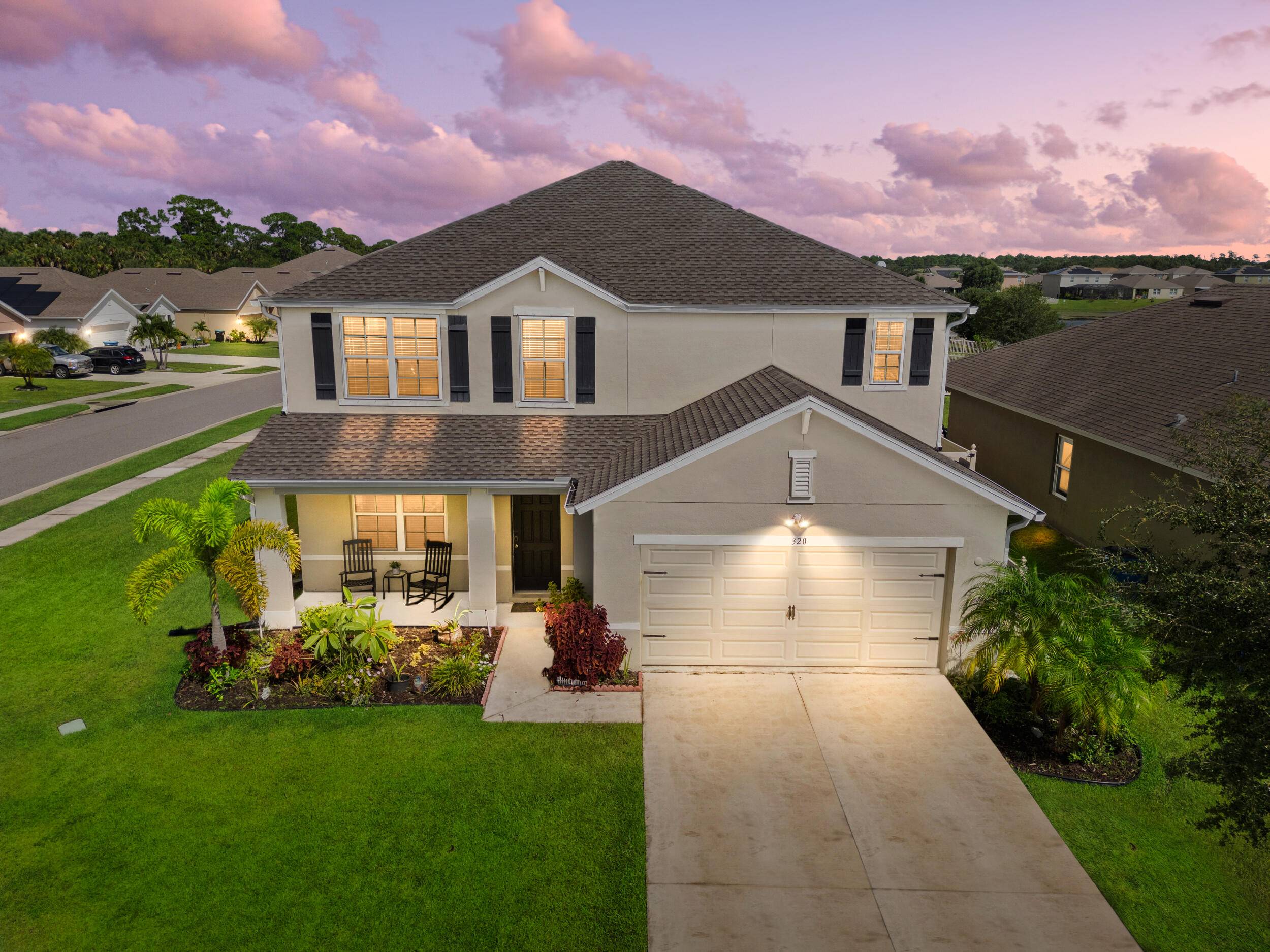Located in the highly sought after Brentwood Lakes gated community in Palm Bay, this spacious 2 story corner lot home perfectly blends comfort with true Florida living.