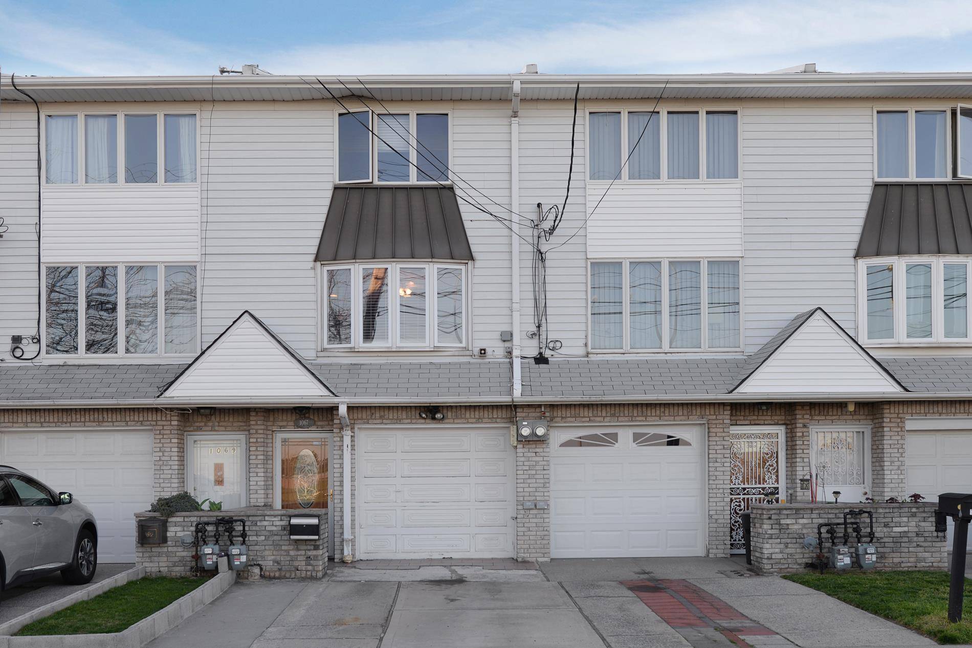 A charming townhouse, this two bedroom home sits seconds away from the shores of Midland Beach.