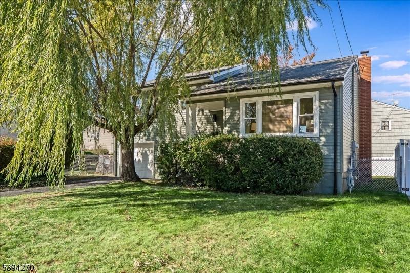 Discover this beautifully renovated split level home, perfectly combining modern design, functionality, and space.