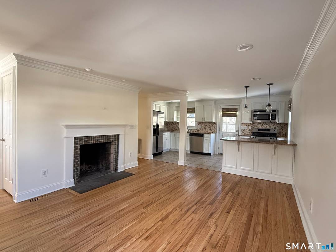 Welcome to this charming, naturally bright Cape Cod home set within the coveted Springdale neighborhood.