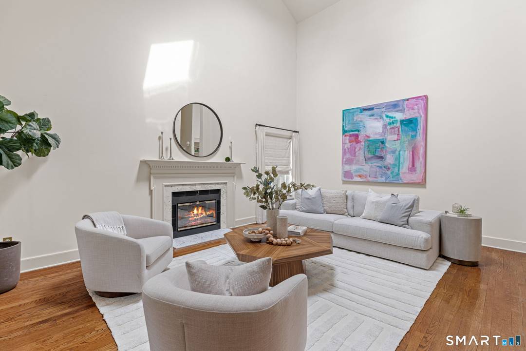 Nestled in the coveted Westover neighborhood of Stamford, this beautifully appointed single family residence in the prestigious Doral Farm association offers an exceptional blend of privacy and low maintenance living.