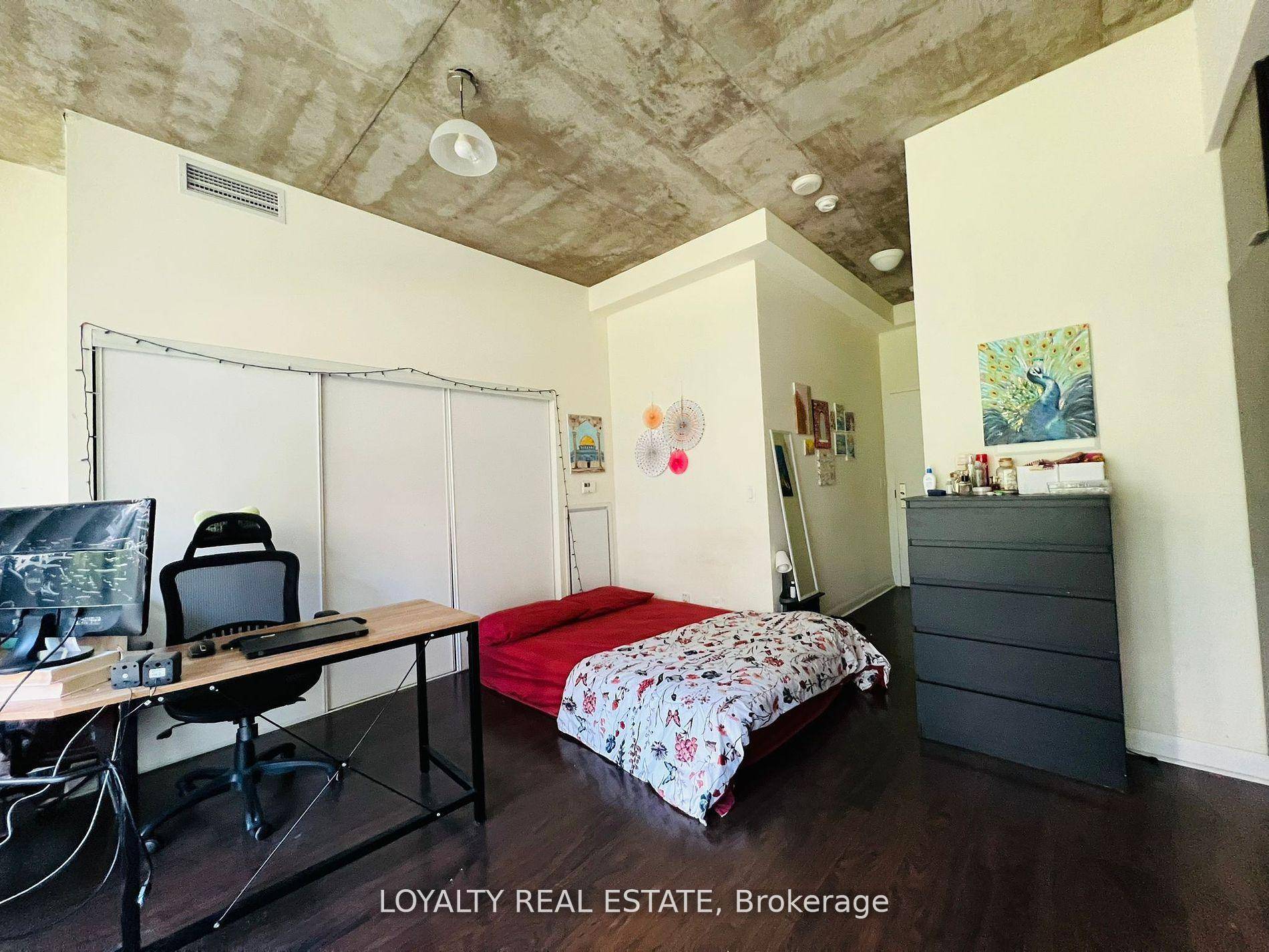Bright and spacious studio apartment with full length balcony and ample ensuite storage at victory condos.