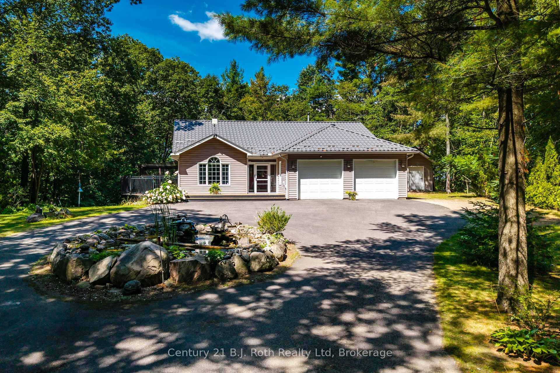 Looking for privacy ? Large detached 30 x 32ft heated shop with 2 garage doors ?