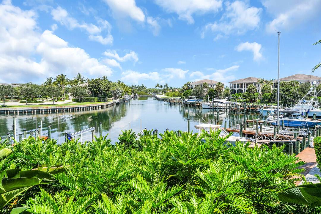 Discover timeless waterfront elegance in the gated enclave of Frenchman's Harbor.