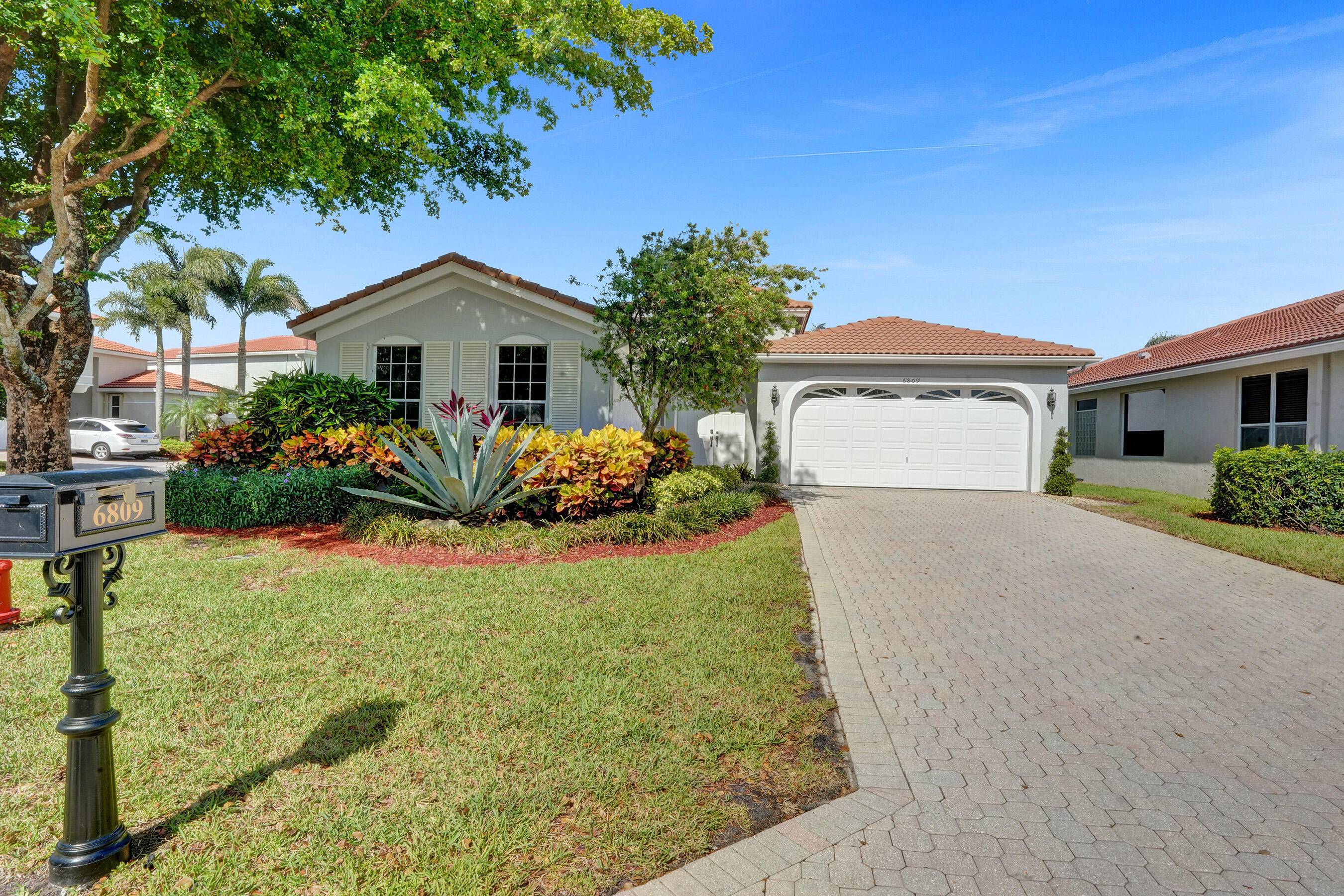 Stunning Lakefront Pool Home in Prestigious Newport Bay Club.