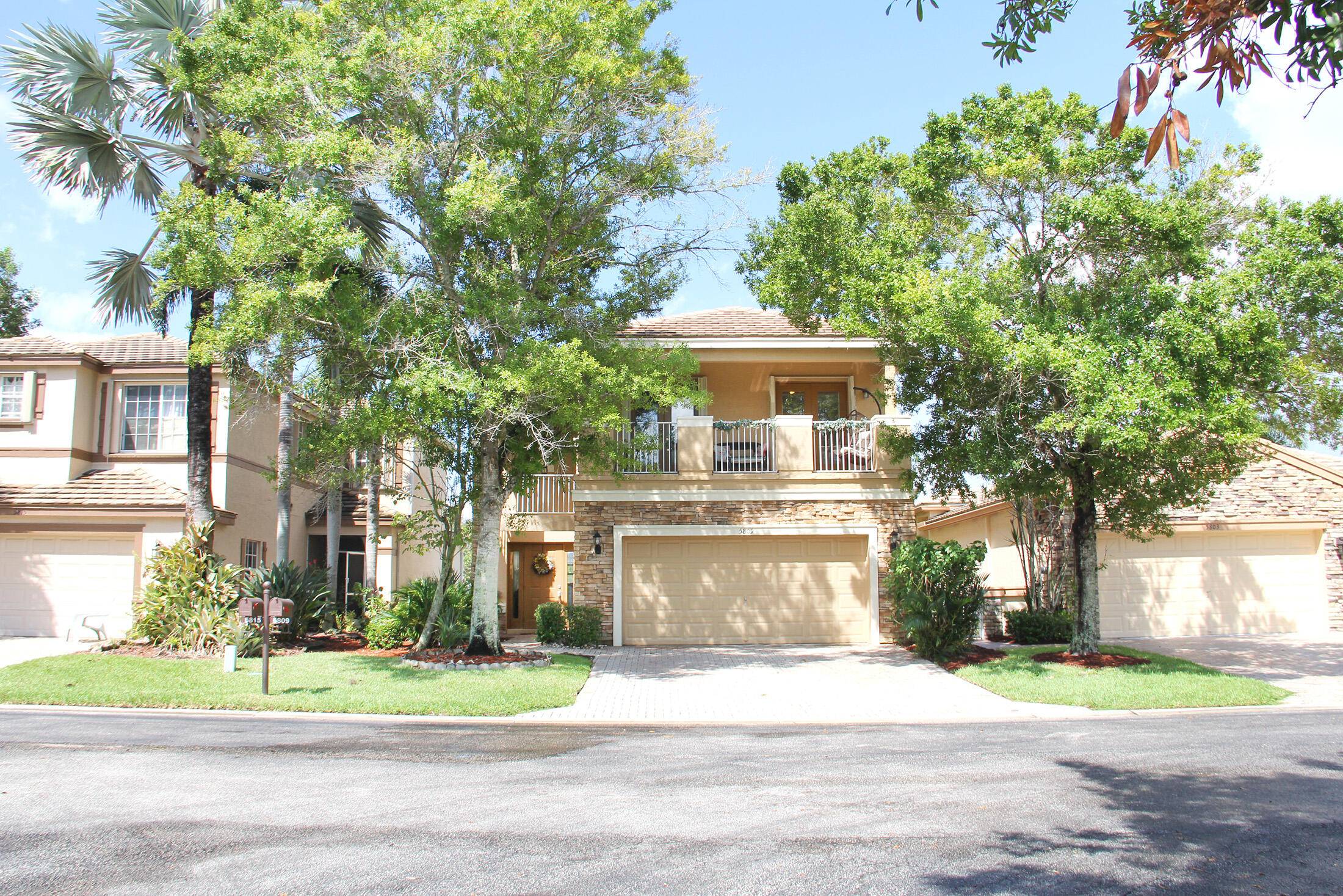 Beautiful furnished lake front home features open concept floor plan, bright kitchen with stainless steel appliances, elegant breakfast nook, kitchen island and patio overlooking the lake.