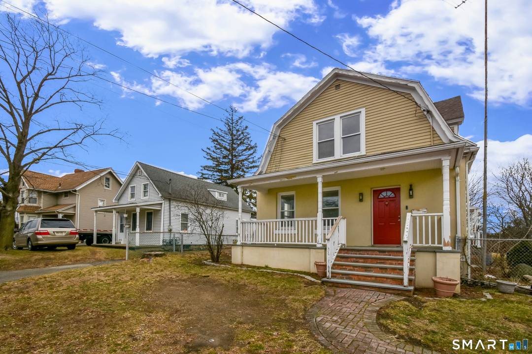 Spacious 3 Bedroom, 2 Bathroom Colonial with a finished walk out lower level within walking distance to the water.