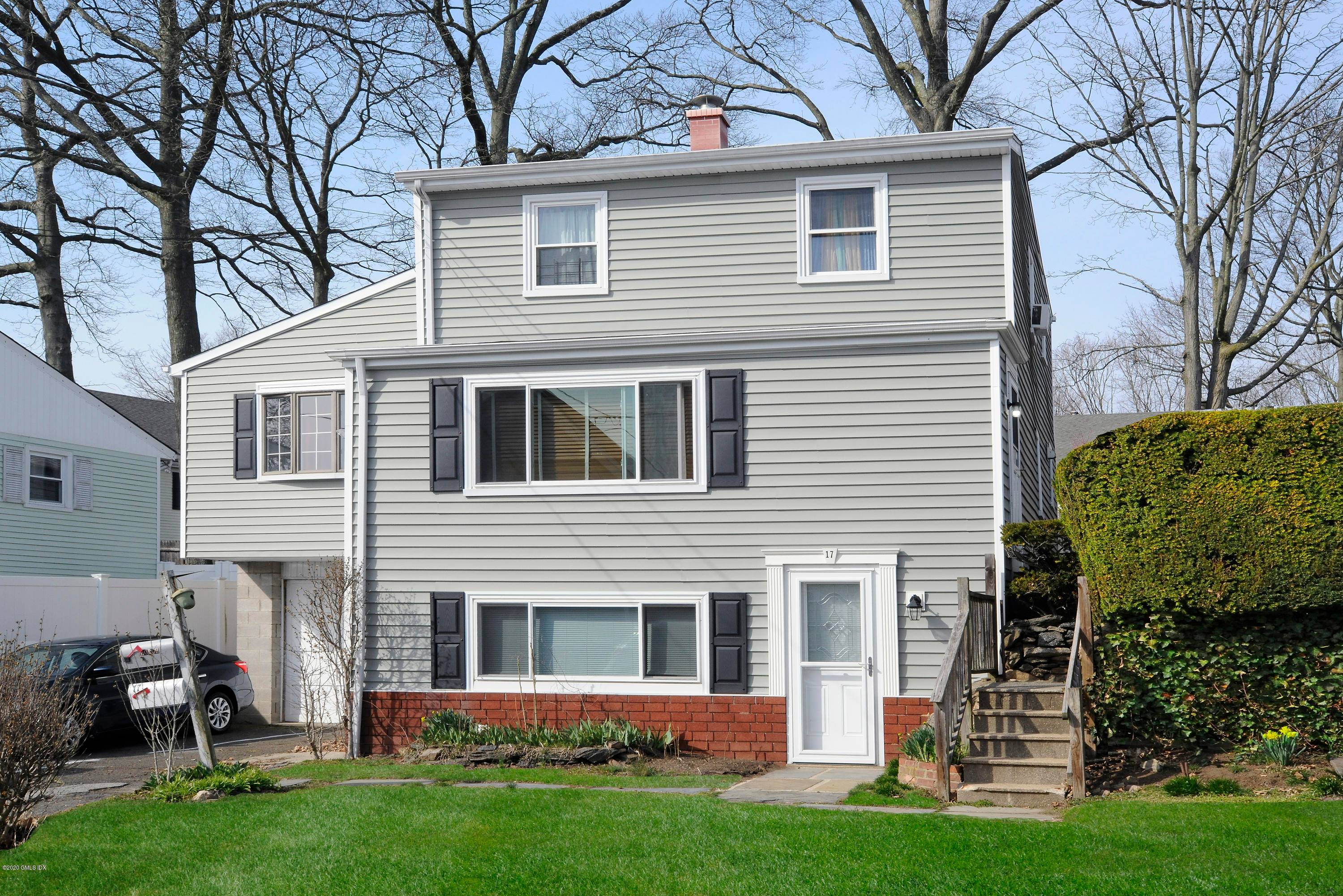 Single Family with level yard and private deck on the side and in the back.