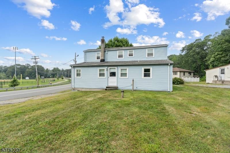 GREAT OPPORTUNITY ! Two Family home Single Family Ranch on one level lot.