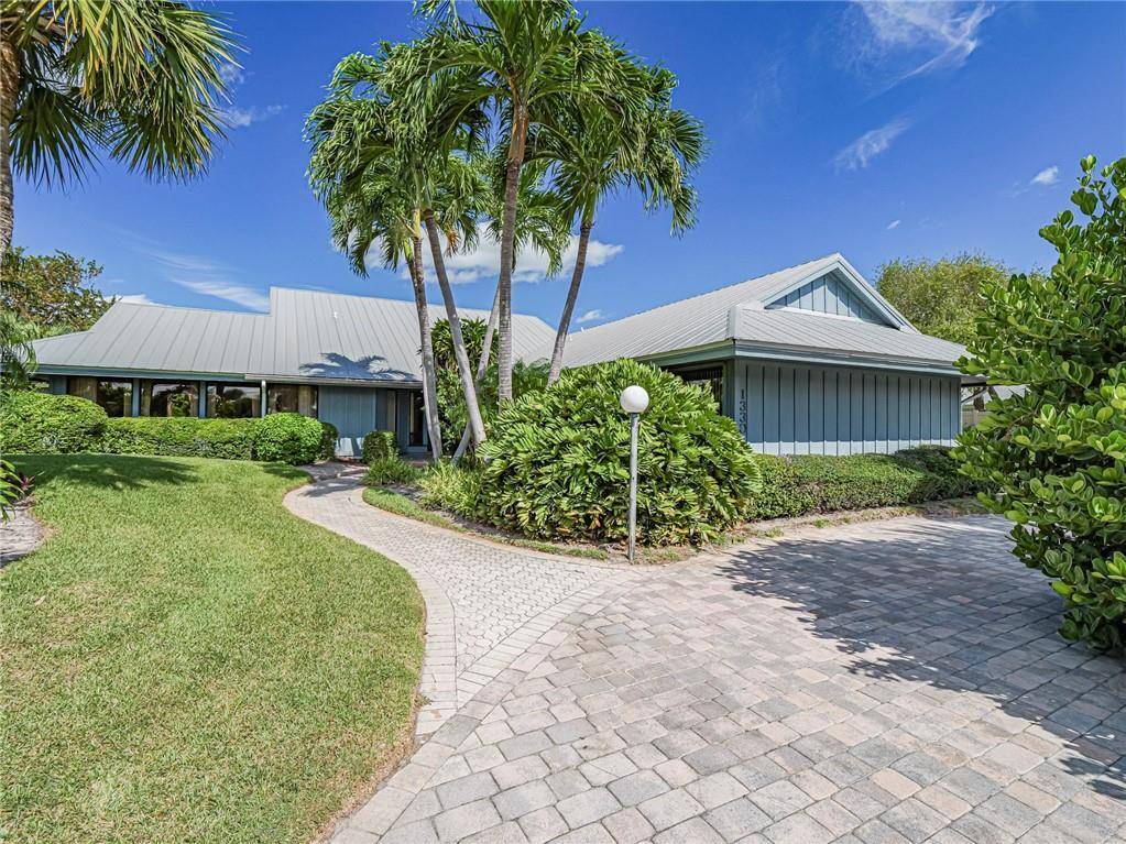 Welcome to this spacious, entertainer's dream home located just seconds from the best beach in Vero Beach, East of A1A !